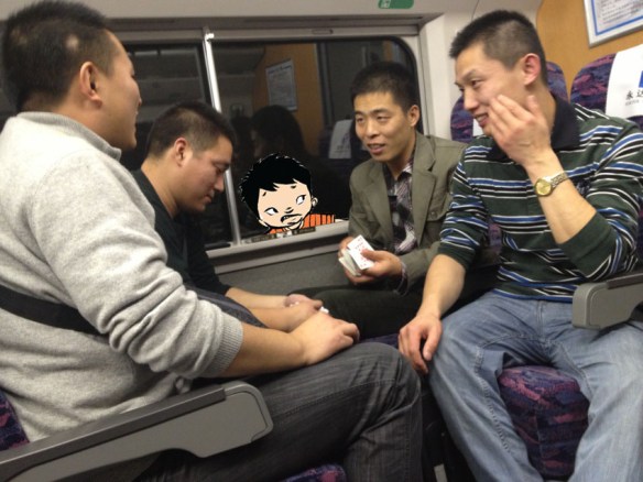 card players across the aisle